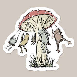 May include: A whimsical illustration of four frogs swinging on a red and white mushroom. The frogs are green, brown, yellow, and gray. The mushroom has a white stem and is surrounded by green grass.