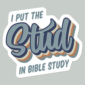 May include: A sticker with a retro design that says "I put the stud in bible study". The text is in a blue, white, and brown color scheme.