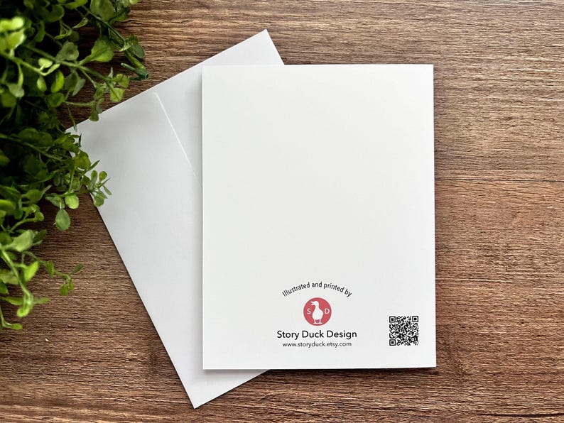 May include: A white card with a red logo that says "Story Duck Design" and a QR code. The text below the logo says "Illustrated and printed by Story Duck Design www.storyduck.etsy.com".