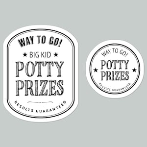 May include: Two black and white stickers with the text "Way to Go! Big Kid Potty Prizes Results Guaranteed" on a white background.