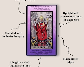 May include: A tarot card with a purple background and black gilded edges. The card depicts a figure wearing a red robe and a crown, sitting on a throne. The card is titled "The Hierophant" and includes keywords like "Conformity to society's rules", "Morality", "Tradition", "Groupthink", "Religion", and "Institutions".
