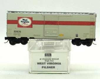 Custom painted and decaled N-scale Micro-Trains boxcar, white and red with West Virginia Pilsner logo