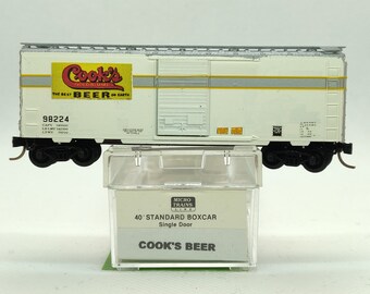 Custom painted and decaled N-scale Micro-Trains boxcar, white with Cook's Beer logo