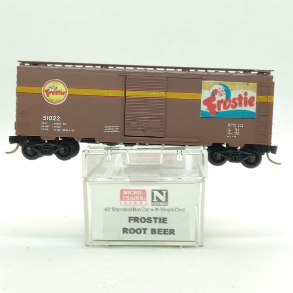 Custom painted and decaled N-scale Micro-Trains boxcar, brown with Frostie Root Beer logo