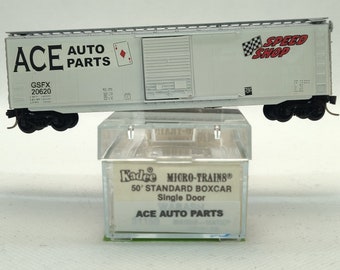 Custom painted and decaled N-scale Kadee Micro-Trains boxcar, white and silver with Ace Auto Parts logo