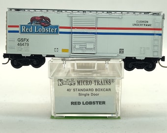 Custom painted and decaled N-scale Kadee Micro-Trains boxcar, white and silver with Red Lobster logo