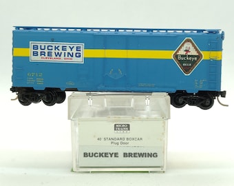 Custom painted and decaled N-scale Micro-Trains boxcar, light blue with Buckeye Brewing logo