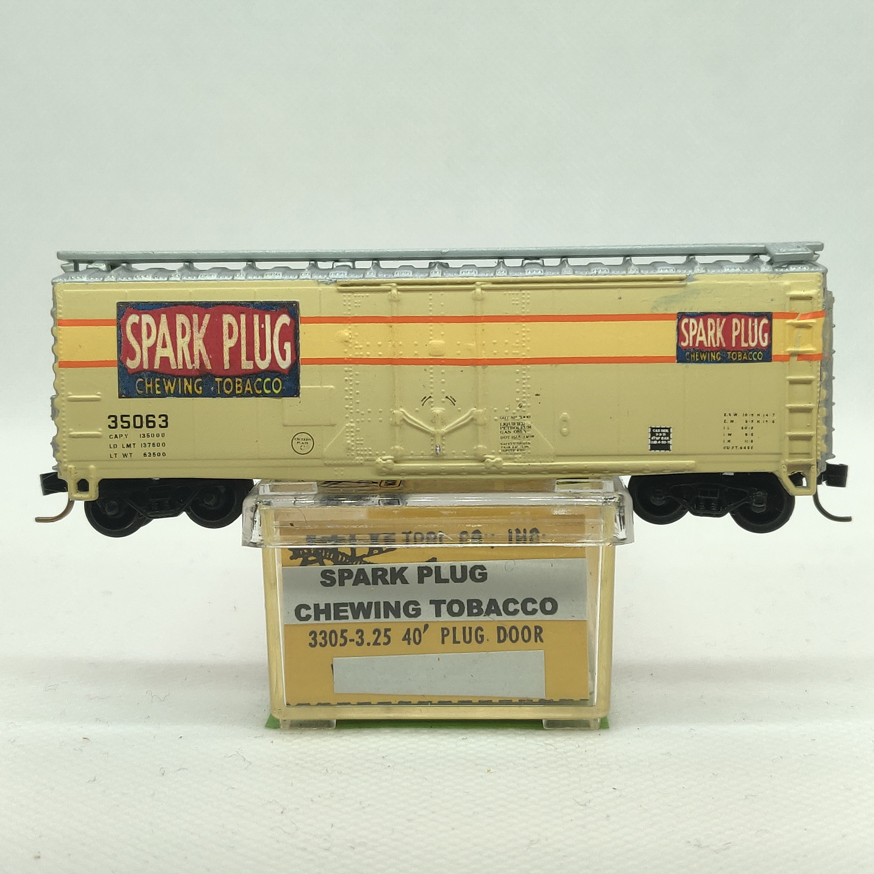 Custom Painted and Decaled N-scale Atlas Boxcar, Ivory-white and Silver  With Spark Plug Chewing Tobacco Logo