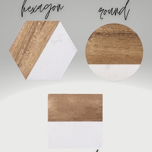 May include: Four coasters in three different shapes: hexagon, round, and square. Each coaster has a wood top and a white marble bottom.