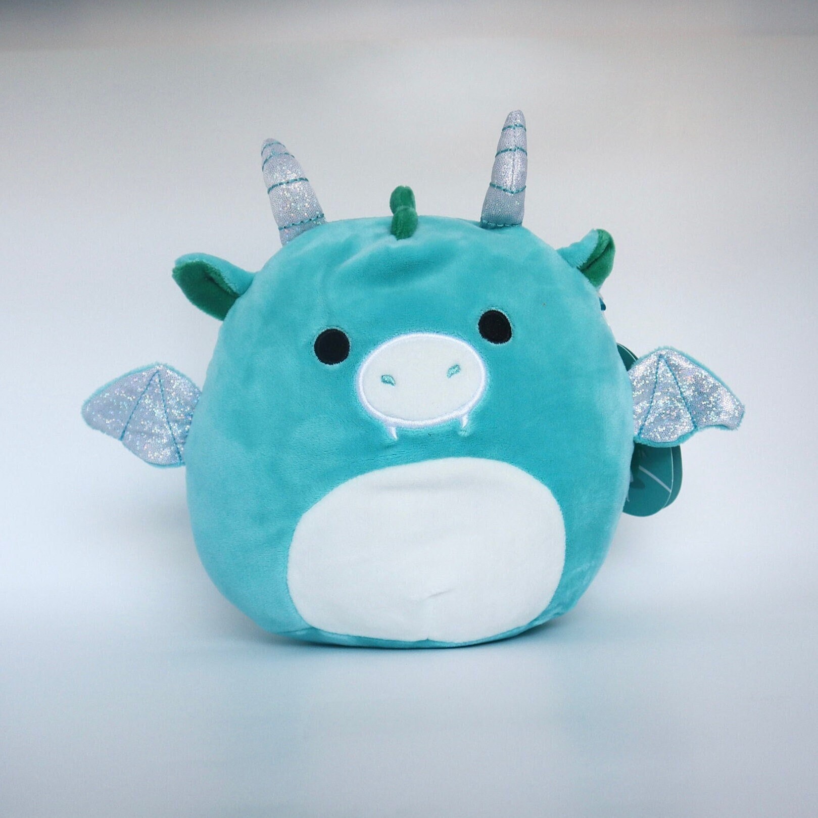 dark blue dragon squishmallow