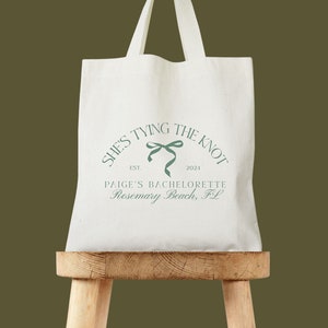 She&#39;s Tying The Knot Bow Name Tote - Coquette Bachelorette - Bridesmaid Gifts - Bachelorette Tote - Girly Bachelorette - Coquette Aesthetic