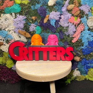 Critters logo / bookcase display / shelf display