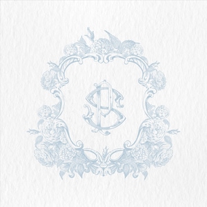 May include: A light blue monogram with the letters "P" and "S" intertwined, surrounded by a decorative floral frame.