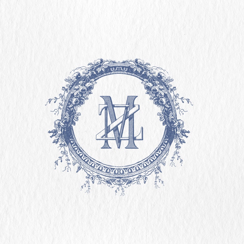 May include: A blue monogram with the letters "ML" in a decorative, ornate frame. The frame is made of a floral design with leaves and flowers.