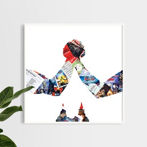 May include: A white framed print of a silhouette of two people holding hands, created with a collage of colorful magazine clippings.