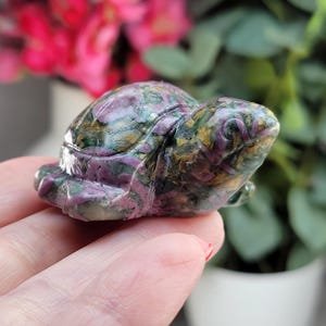 May include: A set of three ceramic mugs with a speckled, matte finish. The mugs are in shades of cream, light gray, and dark gray. Each mug has a simple, minimalist design, perfect for coffee or tea.