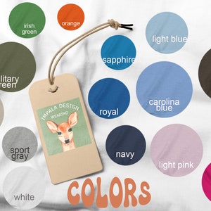 May include: A color chart with 16 different fabric swatches, each with a label describing the color. The colors include forest green, irish green, orange, sand, military green, sport gray, ash, white, sapphire, light blue, gold, dark chocolate, royal, carolina blue, navy, light pink, maroon, and heliconia.