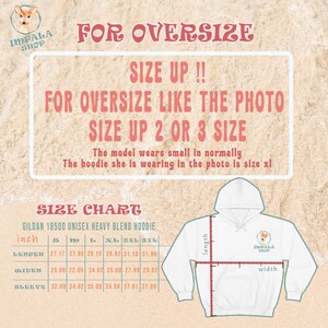 May include: Size chart for a Gildan 18500 unisex heavy blend hoodie. The chart shows measurements in inches for length, width, and sleeve length for sizes S through 3XL. The chart is on a background with a beach scene and the text "For Oversize" and "Size Up 2 or 3 Size".