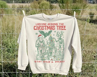 Lurking Around The Christmas Tree Cryptid Creatures Sweatshirt: Retro Xmas Tree shirt - Mothman Xmas Gift Bigfoot Camping Shirt