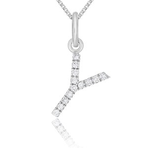 May include: A silver pendant necklace featuring the letter "Y" encrusted with small, sparkling white gemstones. The pendant hangs from a delicate silver chain, reflecting light. The design is simple and elegant.