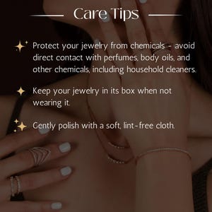 May include: A white ceramic mug with a black handle and the text "But First, Coffee" in a bold, black font. The mug is set against a blurred background, suggesting a cozy setting.