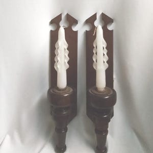 Candelabros de pared de madera de mediados de siglo. Apliques MCM