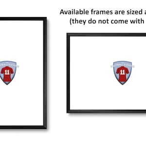 May include: Two black picture frames, one A4 and one A3 size, with a red and white football jersey design inside. The text "The Football Eleven" is above the jersey. The frames do not come with a mount.