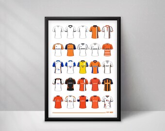 May include: A framed poster displaying a grid of twenty-five illustrated sports jerseys in various colors including orange, white, blue, yellow, and black. The jerseys feature different necklines and sleeve lengths. The text EST. 1895 appears at the bottom.