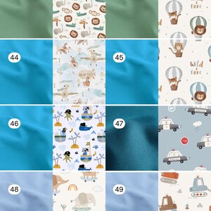 May include: A grid of fabric swatches labeled 42 through 49. The collection includes solid sage green, bright blue, and dark teal fabrics alongside patterned prints featuring cartoon animals, hot air balloons, police cars, and construction vehicles.