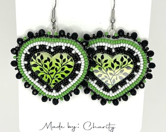 Beaded Earrings made with acrylic centers and Size 11 Seeds beads.  Sterling silver hooks