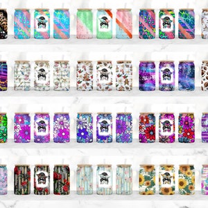 May include: A set of 40 colorful, patterned, stainless steel tumblers with a straw. Each tumbler features a different design with a cartoon character wearing sunglasses.
