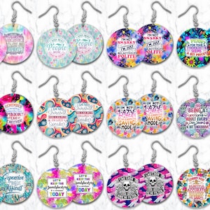 May include: A collection of round dangle earrings with various colorful designs and humorous quotes. The earrings feature text like "I'm not snarky, I'm just selectively polite" and "Expensive, Difficult". Each pair has a silver hook.