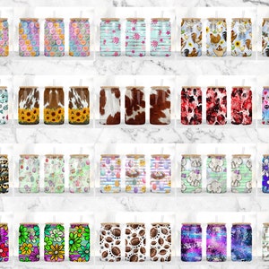 May include: Twenty different designs for skinny tumblers with various patterns and colors. The tumblers are all the same size and shape, and they have a straw.