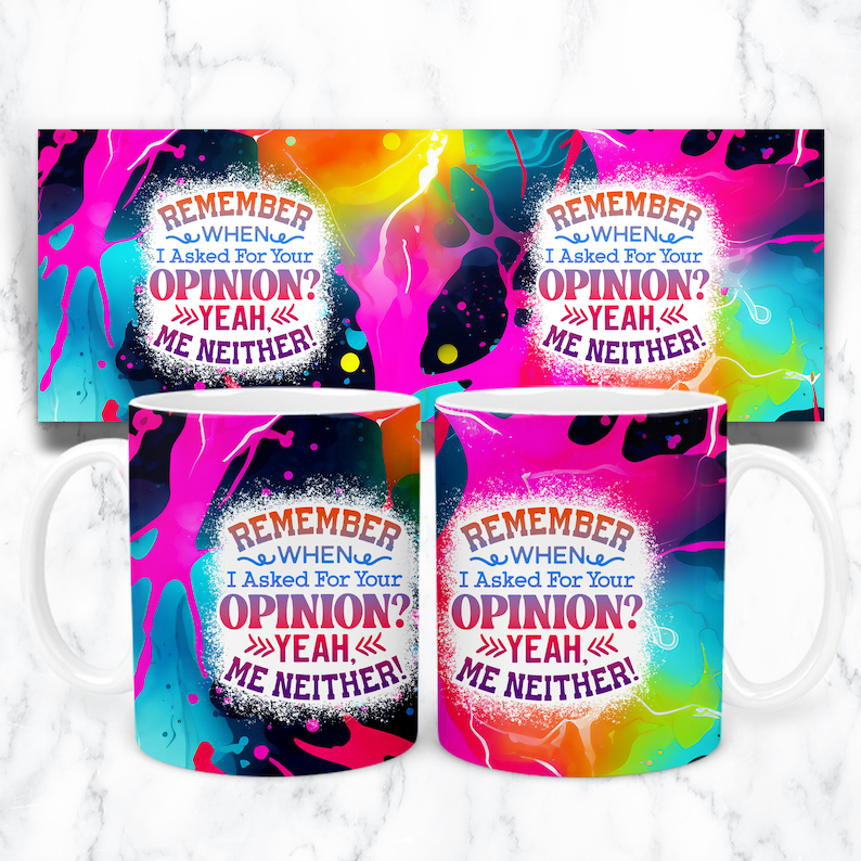 May include: Two white coffee mugs with a colorful abstract design. The mugs feature the text "Remember when I asked for your opinion? Yeah, me neither!" in a spray paint style font.