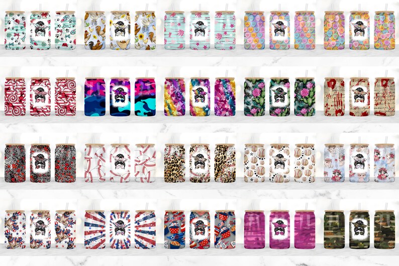 May include: A collection of 20 different patterned stainless steel tumblers with a straw. Each tumbler features a unique design with a variety of colors and patterns, including floral, geometric, and abstract designs.