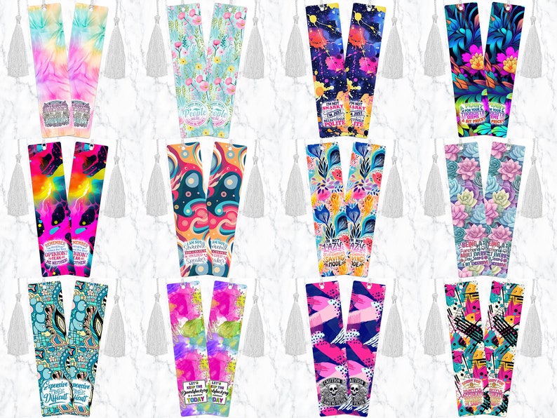 May include: Set of 10 colorful bookmarks with inspirational quotes and tassels. The bookmarks feature a variety of patterns, including tie-dye, floral, and abstract designs. The quotes include "I'm not scary, I'm just highly motivated", "Being amazing is hard work, but I'm up for the challenge", and "Let's keep the magic happening today".