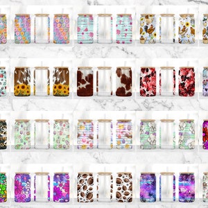 Puede incluir: Veinticuatro dise&ntilde;os diferentes de vasos reutilizables con tapas y pajitas de bamb&uacute;. Los vasos son de vidrio transparente con patrones coloridos en el exterior. Los patrones incluyen corazones, flores, animales y dise&ntilde;os abstractos.