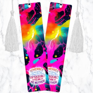 May include: Two colorful bookmarks with a pink, yellow, blue, and black abstract design. The bookmarks have a white tassel and text that reads "REMEMBER WHEN I ASKED FOR YOUR OPINION? YEAH ME NEITHER!" and "MEMBER WHEN I ASKED FOR YOUR OPINION? YEAH EITHER!"