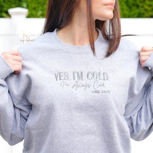 Embroidered Always Cold Sweatshirt: Funny Cold Friend Crewneck