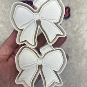 Bow vent clip freshie mold. Cheer bow vents mold. Silicone freshie mold! Freshie mold