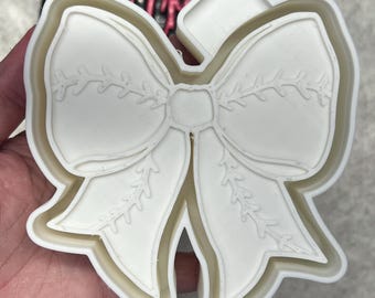 Baseball or softball style bow freshie mold.  Baseball bow mold. Softball bow mold! Freshie mold