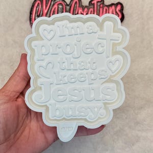 May include: A set of three ceramic mugs with a speckled, matte finish. The mugs are in shades of cream, light gray, and dark gray. Each mug has a simple, minimalist design, perfect for coffee or tea.