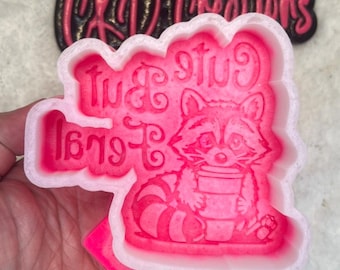 Cute but feral freshie mold. Raccoon mold. Raccoon and cup mold. Silicone freshie mold! Freshie mold