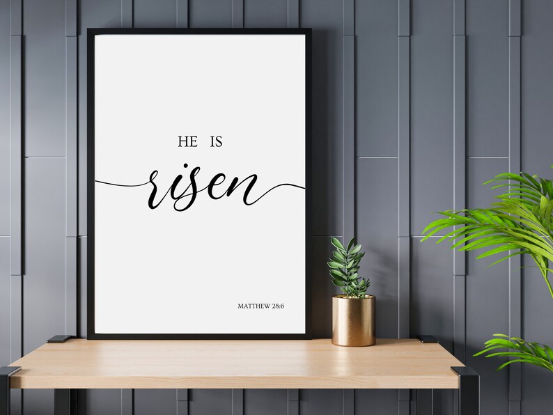 A picture frame of black text on a white background.  The bible verse "He is Risen." from Matthew 28:6.