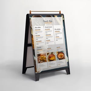 May include: A-frame brunch menu template with a black frame and a gold-colored handle. The menu features sections for main dishes, second courses, and desserts, with images of food. The text includes "Brunch Menu Template".