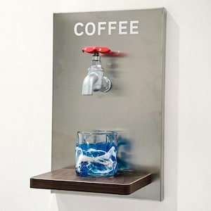 May include: A stainless steel coffee station with a faucet and a red handle. The word "COFFEE" is printed at the top. A glass with blue and white swirls sits on a wooden shelf below the faucet.
