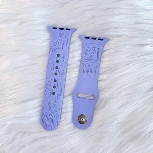 May include: A lavender silicone Apple Watch band with a design of various cleaning products and the text "Clean Boss".