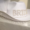 Personalized Pearl Bride Cowgirl Hat with Veil,Rhinestone Fringe Wifey Cowboy Hat,Pink Bridesmaid Cow Girl Hat,Bachlorette Gift,Bride To Be product logo
