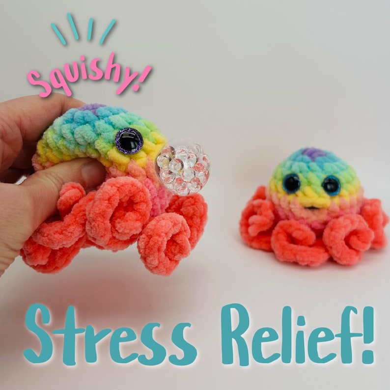 May include: Two rainbow crocheted octopus plushies with googly eyes. The octopus on the left is being squeezed and has a clear plastic bead in its mouth. The text "Squishy!" is above the octopus and the text "Stress Relief!" is below the octopus.