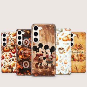 May include: A collection of phone cases with fall-themed designs. The cases feature images of pumpkins, autumn leaves, Mickey and Minnie Mouse, and the text "Thanksgiving". The color palette includes shades of orange, brown, and beige.